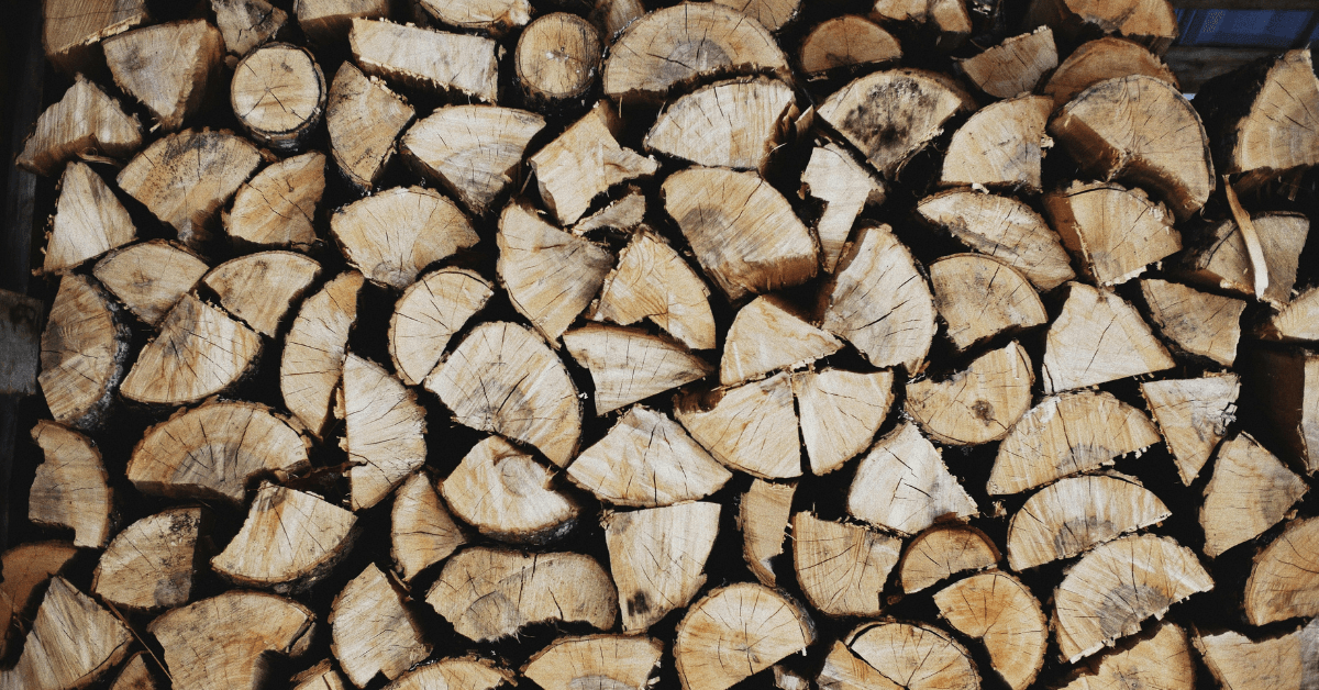 Stacked seasoned hardwood firewood ready for delivery in Evansville, IN